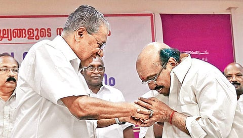 Kerala Chief Minister Pinarayi Vijayan with SNDP Yogam general secretary Vellappally Natesan. 