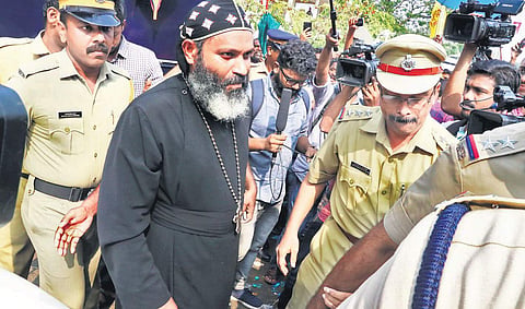 Fr Thomas Paul Ramban being shifted to hospital from the premises of  St Thomas Church, Kothamangalam, on Friday | Express