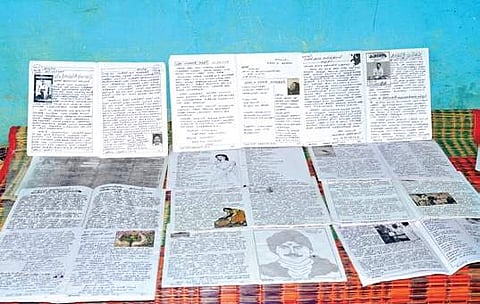 M S Govindarajan (left) with his Thazhampoo journal in which he drew the cover with famous martial arts expert Bruce Lee.