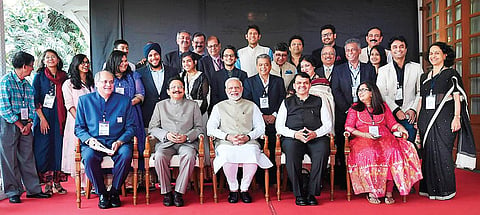 Prime Minister Narendra Modi with the members of RK Laxman’s family.