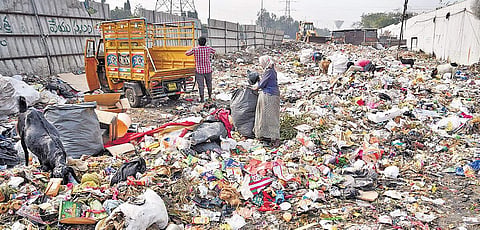 A dumpyard that is located on the service road next to Patancheruvu highway, in Hyderabad on Thursday | R Satish Babu