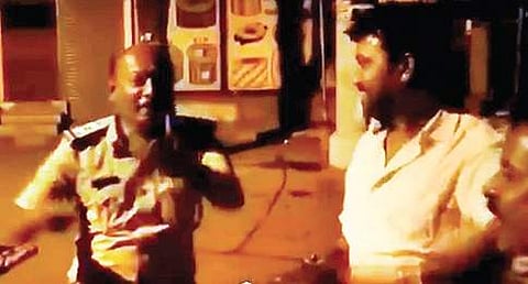A video grab of the police officer dancing with a history-sheeter
