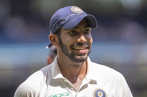 India's Jasprit Bumrah walks off the field after getting 6 wickets in the first innings during play on day three of the third cricket test between India and Australia in Melbourne. (Photo | AP)