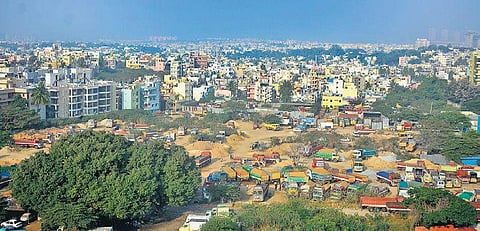 The drying Jaraganahalli lake has been encroached by buildings | Shriram B N