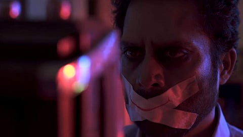 Screen grab of the music video Jananaayagam.