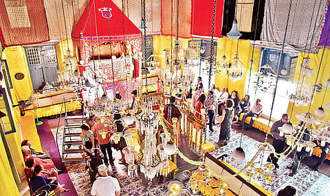 The synagogue looks resplendent with lights and decorations that reflect its heritage.