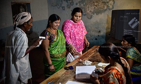 People casting their vote in Telangana Assembly Elections in Different places of Rangareddy District on Friday. (Vinay Madapu/EPS)