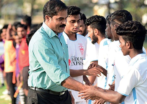 Kerala Football Association general secretary P Anilkumar greeting players and match officials on Wednesday  | MELTON ANTONY