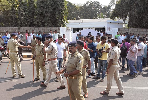 Police guarding the residence of IAS officer VK Pandian after an attack by BJP activists. | Express Photo Services