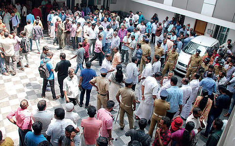People who gathered on the Medical Trust Hospital premises after they came to know about the blast  |  K Shijith