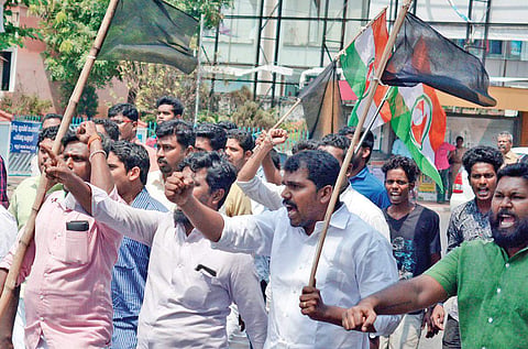 Youth Congress workers taking out a march in Thiruvananthapuram on Tuesday. (Photo | Manu R Mavelil)
