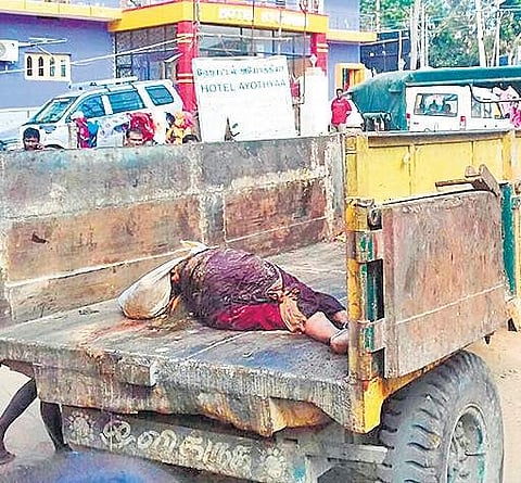 The body of Odisha native Ramamani being taken on a garbage truck in Rameswaram on Thursday | Express