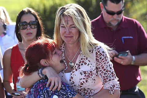 Parents wait for news after a reports of a shooting at Marjory Stoneman Douglas High School in Florida. (File | AP)