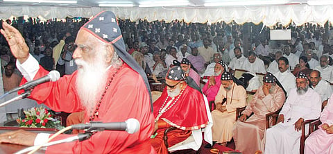 Mar Thoma Church supreme head Joseph Mar Thoma Metropolitan blessing the faithful during the valedictory meeting of the 123rd Maramon convention on Sunday