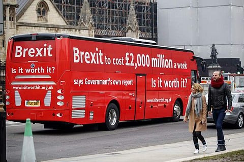 The Brexit Facts Bus, rolled out by European Union advocates as they kick off a new initiative against Brexit, drives around Parliament Square in central London. | AFP
