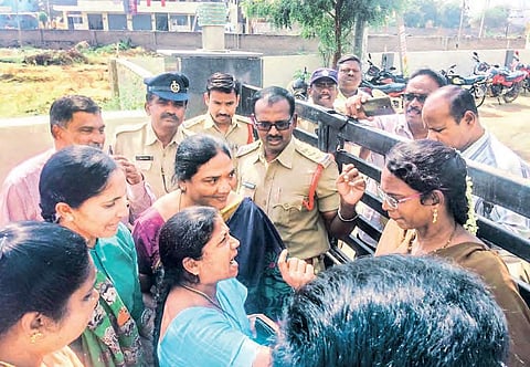 Kurnool Bar Association president V Nagalakshmi Devi arguing with the police over her house arrest on Thursday. (Below) The ‘detained’ advocates at a police station in Kurnool district  | Express