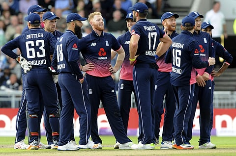 England's Ben Stokes, centre, reacts after a successful review for West Indies Marlon Samuels wicket is confirmed on ground screen during the first One Day International match between England and West Indies at Old Trafford. | AP File Image
