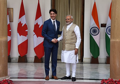 Prime Minister Narendra Modi shakes hands with his Canadian counterpart Justin Trudeau at Hyderabad House in New Delhi. (EPS | Shekhar Yadav)