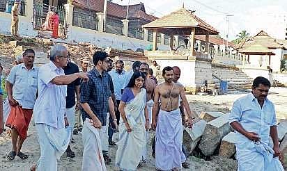 Travancore royal family members Aswathi Thirunal Gowri Lakshmi Bayi and Aditya Varma visiting the Padmatheertham pond at Sree Padmanabhaswamy temple on Sunday to view the demolished structures | Express