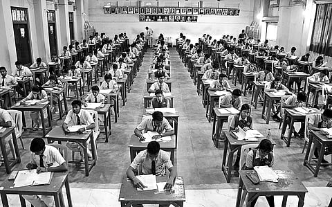 Students writing English paper at an examination centre in Bhubaneswar on Monday  | shamim qureshy