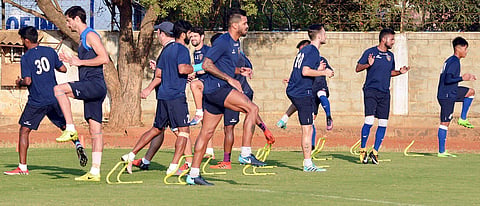 Chennaiyin FC players practising. | Express Photo Service