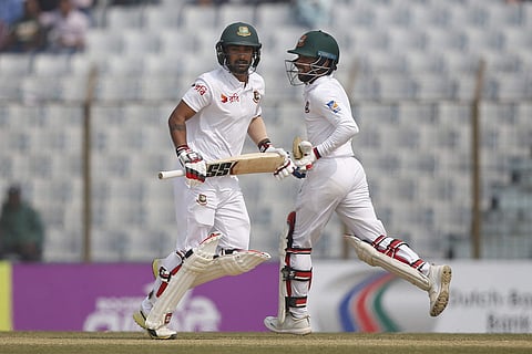 Bangladesh's Liton Das and teammate Mominul Haque score a run during the match. (Photo | AP)