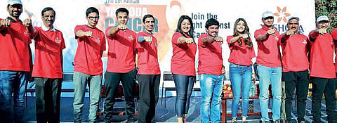Cancer can be cured, prevented say marathon runners