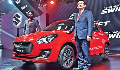 Maruti Suzuki’s MD & CEO Kenichi Ayukawa (R) and Senior ED, Marketing and Sales, RS Kalsi at the Auto Expo 2018  |  PTI