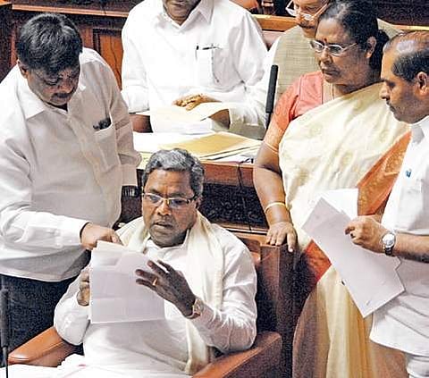 Legislators interacting with Chief Minister Siddaramaiah in the Legislative Council on Thursday   | KPN