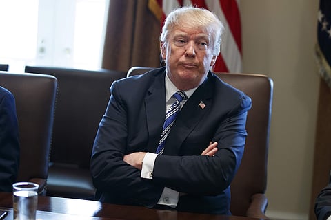 In this March 8, 2018, file photo, President Donald Trump listens during a cabinet meeting at the White House in Washington. (AP)