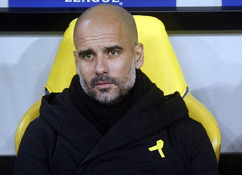 Manchester City manager Pep Guardiola promoting a political message by wearing a ribbon to support the Cataln cause. (File | AP)