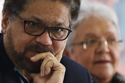 Ivan Marquez, a former leader of the Revolutionary Armed Forces of Colombia, FARC, pauses during the announcement of the withdrawal of former guerrilla commander Rodrigo Londono from the race for president. | AP