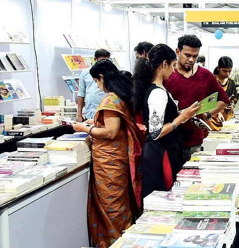 Visitors going though books at the Krithi International Book Festival  Albin Mathew