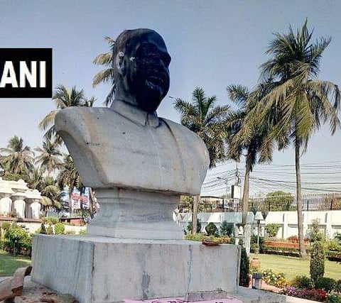 Picture of a vandalized statue of Jan Sangh founder Syama Prasad Mookerjee in Kolkata. | ANI Twitter Picture