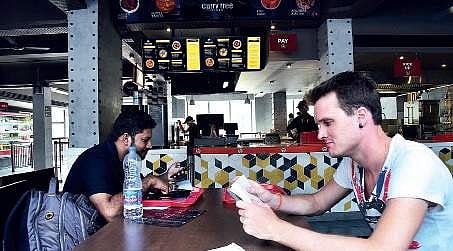 A customer inside the Food Stop Diner on platform number 1  at Ernakulam South Railway station.