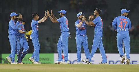 India's Jaydev Unadkat, second right, celebrates the dismissal of Bangladeshi batsman Soumya Sarkar with his team mates during their Twenty20 cricket match in Nidahas triangular series in Colombo, Sri Lanka, Thursday, March 8, 2018. | AP