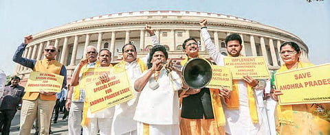 TDP MPs protest at the Parliament building in New Delhi on Monday seeking Special Category Status to AP | Shekhar Yadav