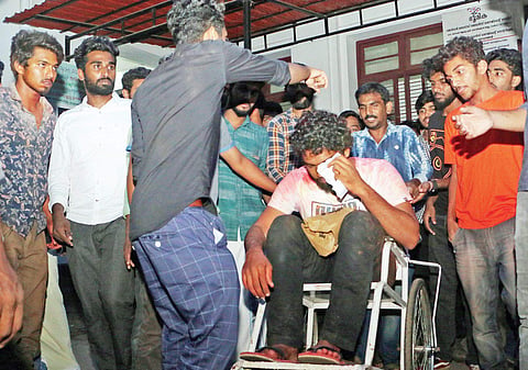 (Left and top) Second-year graduate students of Farook College who suffered injuries in a clash between teachers and students on Thursday | T P Sooraj