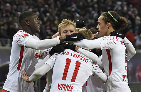 RB Leipzig's Timo Werner, center, celebrates together with his teammates after scoring a goal during the German first division Bundesliga soccer match against Bayern Munich. | AP