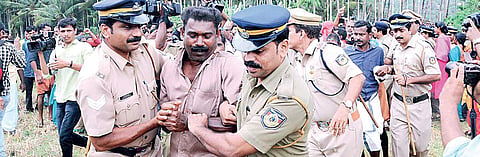 Police forcefully removing the Vayalkkili activists at Keezhattur in Kannur | File picture