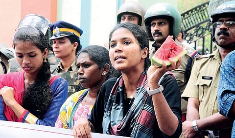 SFI workers who took out a march to Farook Training College the other day demanding action against the professor for his sexist remarks | express