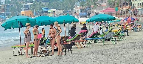 Tourists at Kovalam beach  | Express