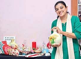Veena Jacob does decoupage art on all manner of objects, from furniture to candles to soap  B P Deepu