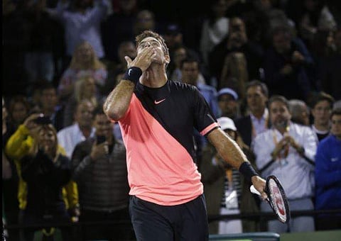 Juan Martin del Potro of Argentina kisses the sky after defeating Robin Haase of the Netherlands | AP
