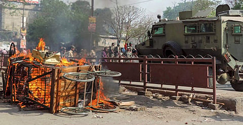 A scene of arson after violent clashes between two groups during a Ramnavmi procession in Aurangabad district on Monday. | PTI