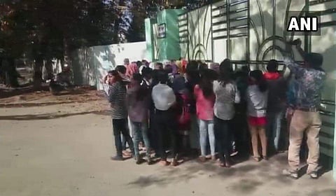 At least 40 girls, residing in one of the hostels of Dr Hari Singh Gour University in Sagar, allege that they were stripped & searched by hostel warden after a used sanitary pad was found lying in the hostel premises. | ANI