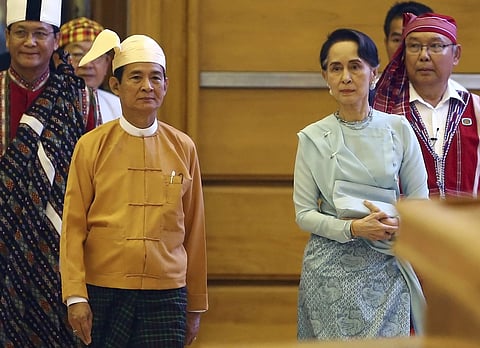 Myanmar's new President Win Myint (left) with leader Aung San Suu Kyi (right)