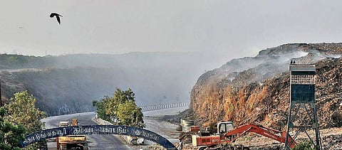 Smoke arising from Kodungayur dump yard near the city on Monday  | P Jawahar