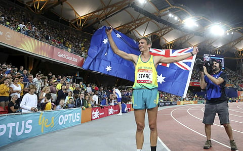 Australia's Brandon Starc celebrates his gold medal for the men's high jump final at Carrara Stadium during the Commonwealth Games on the Gold Coast, Australia, Wednesday, April 11, 2018. | AP
