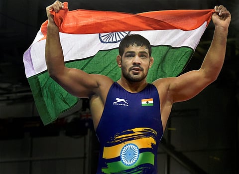 Indian wrestler Sushil Kumar defeated South Africa's Johannes Botha to clinch gold in men's wrestling 74kg  at Gold Coast | AP